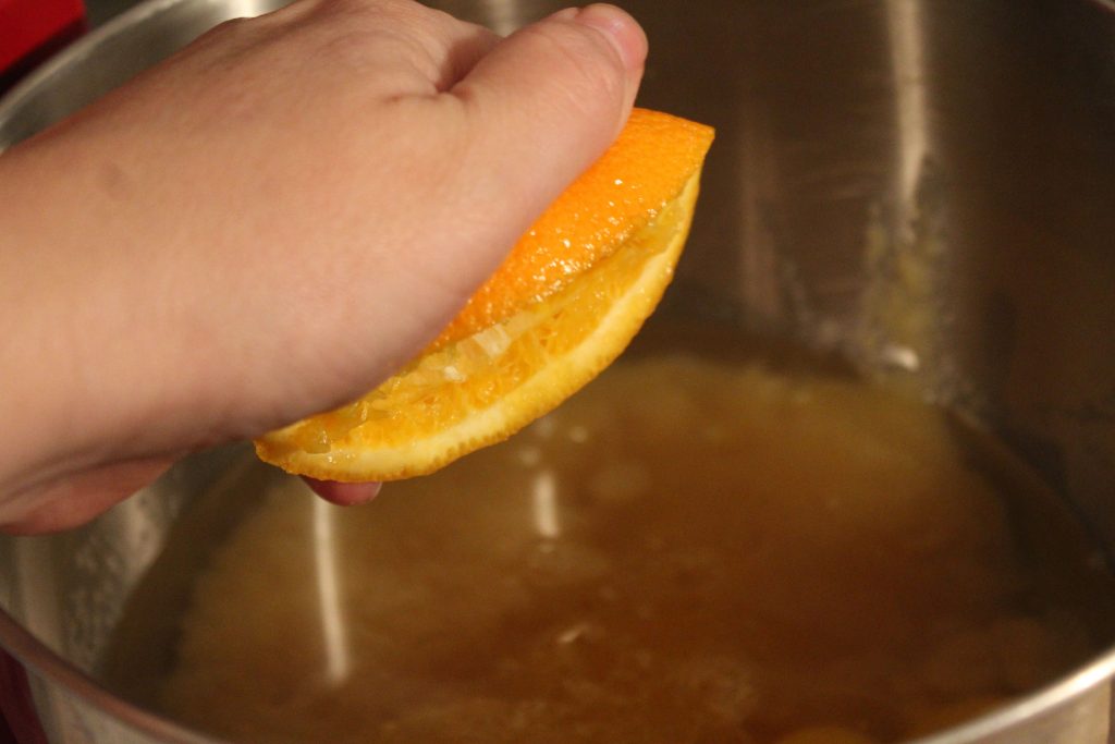 squeezing orange
