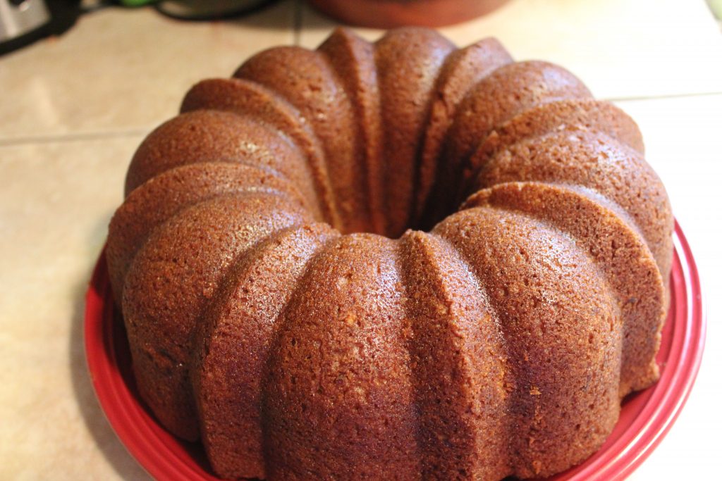 Apple Bundt Cake cooling on plate