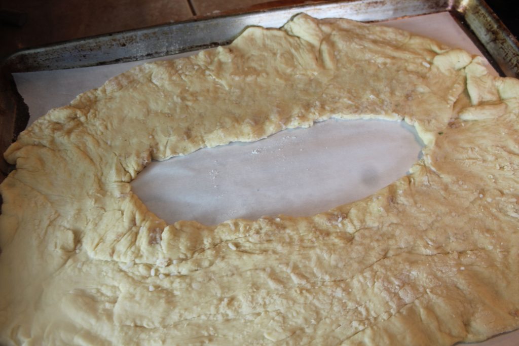 shaping dough in an oval