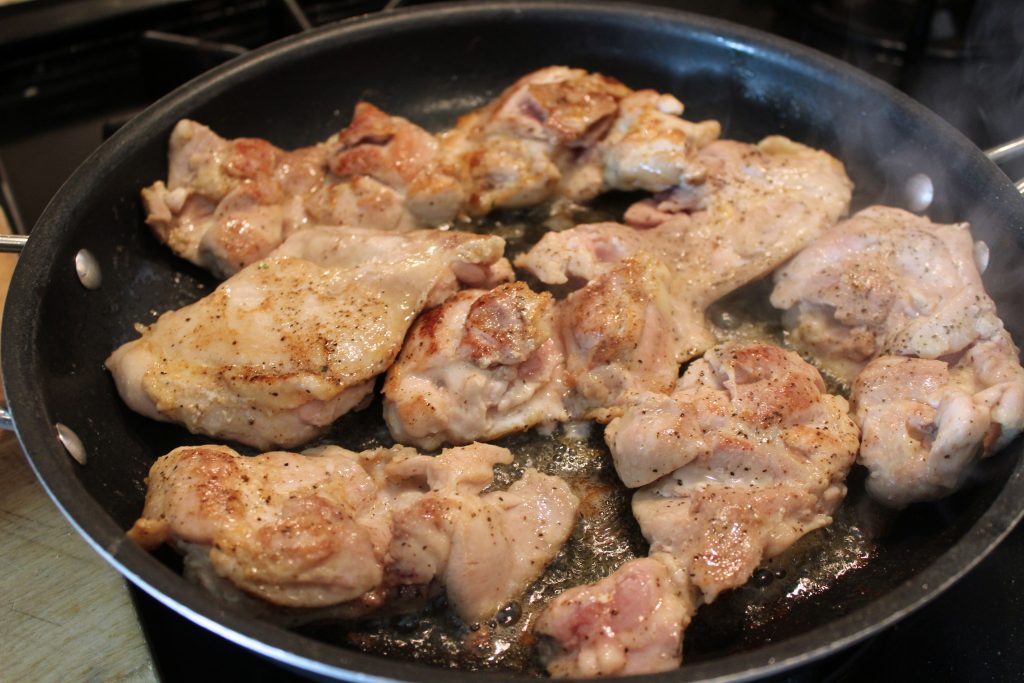 Browning the chicken thighs