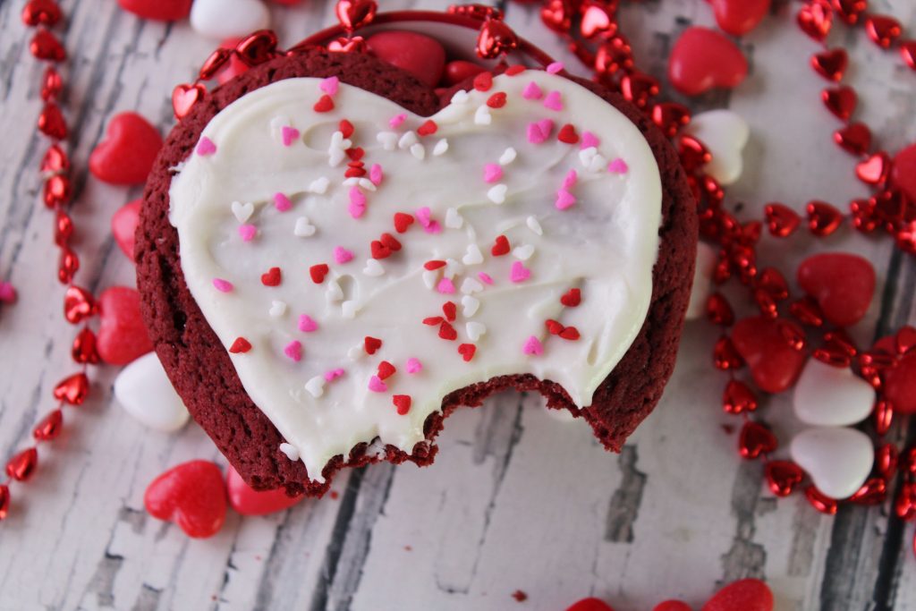 Bite taken out of Red Velvet heart cookie