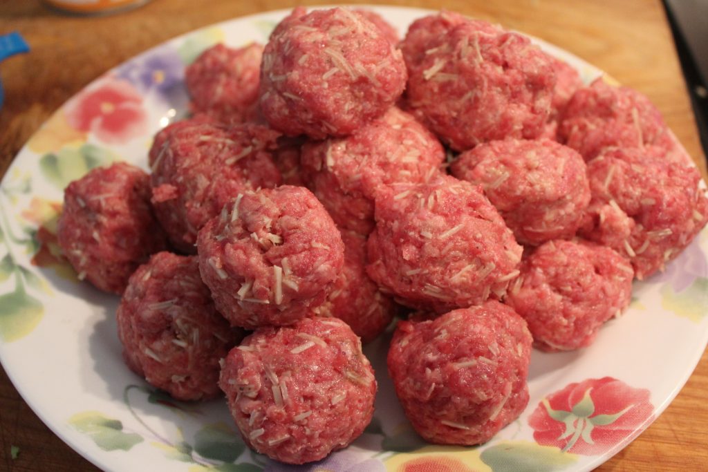 uncooked meatballs
