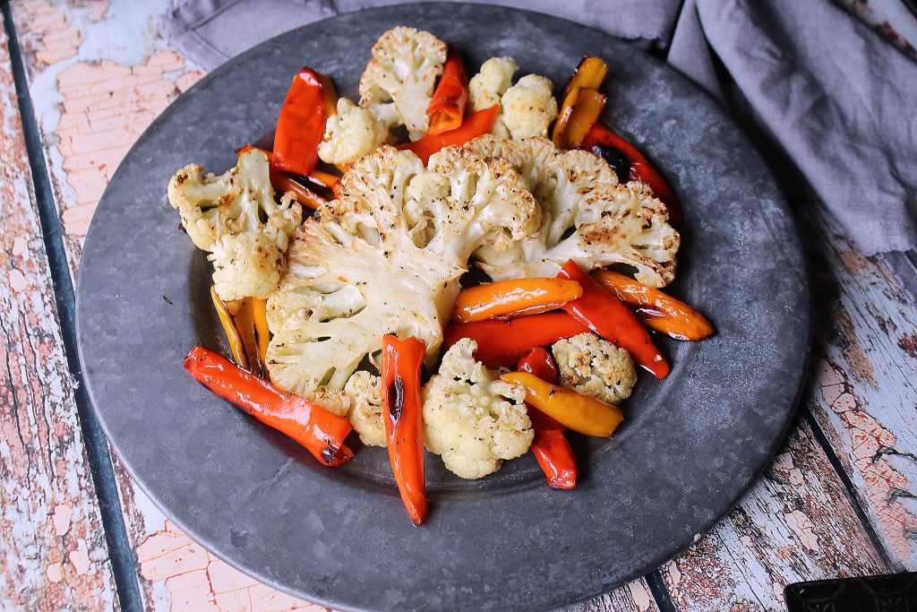 Roasted Cauliflower with Sweet Mini Peppers on a platter