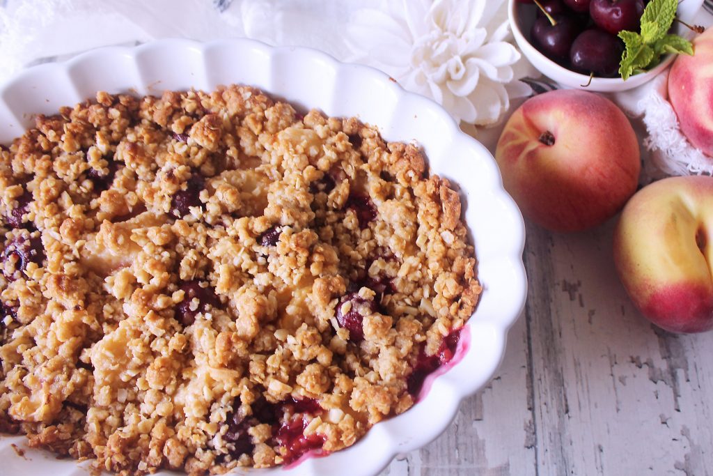 Peach and Cherry Crisp in a baking dish.
