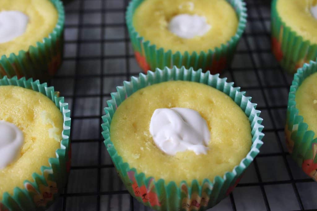 Filling cupcakes with filling