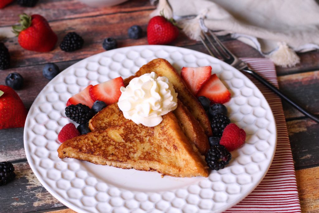 Brioche French Toast with berries and whipped cream