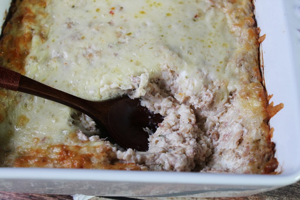 Boudin Dip with a spoon in it