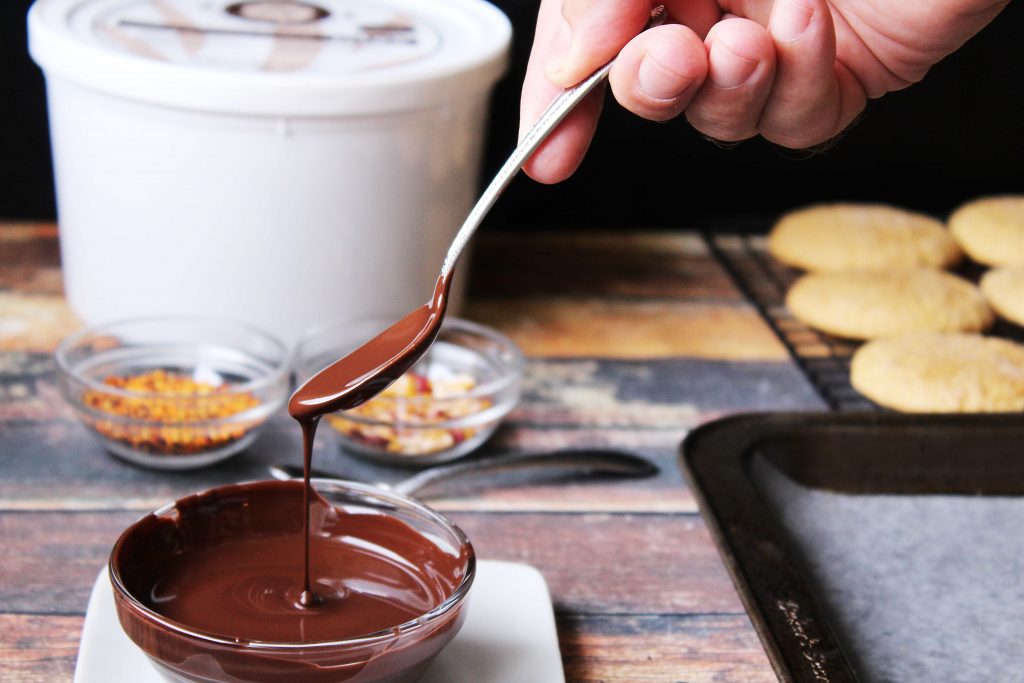 Melted Chocoley Chocolate dripping from a spoon