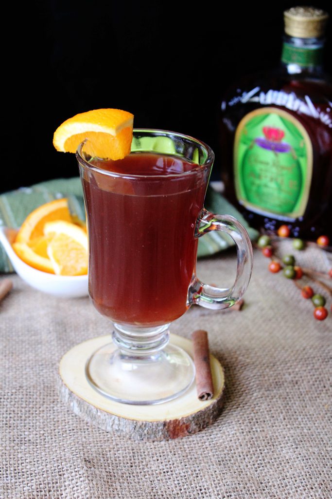 Crown Apple Hot Toddy with an orange wedge