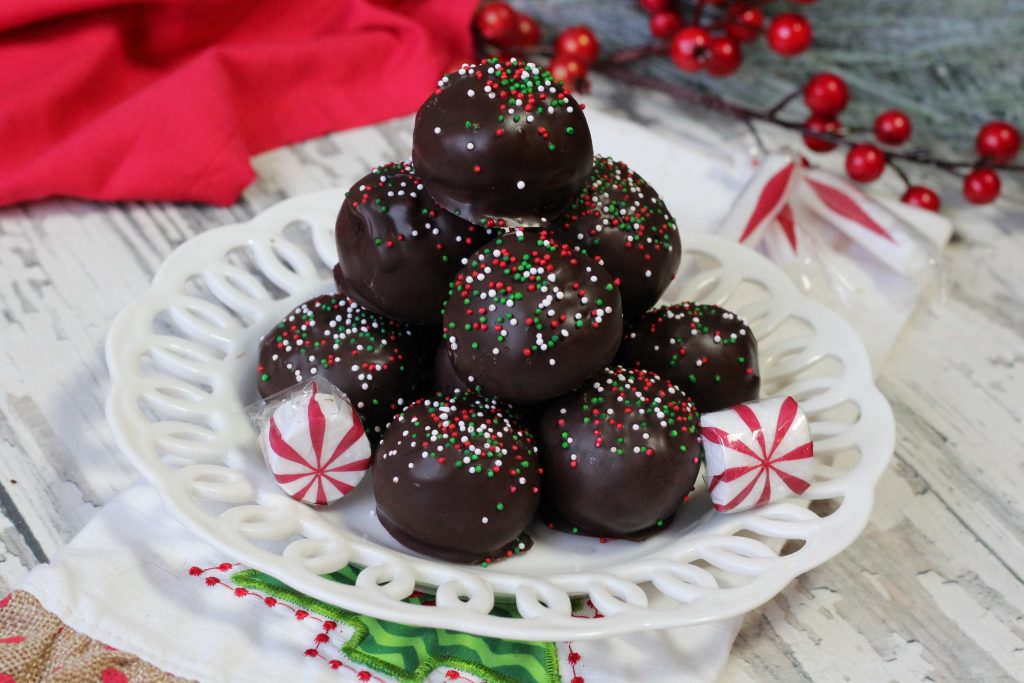 Chocolate Peppermint cake Balls tower on a white plate