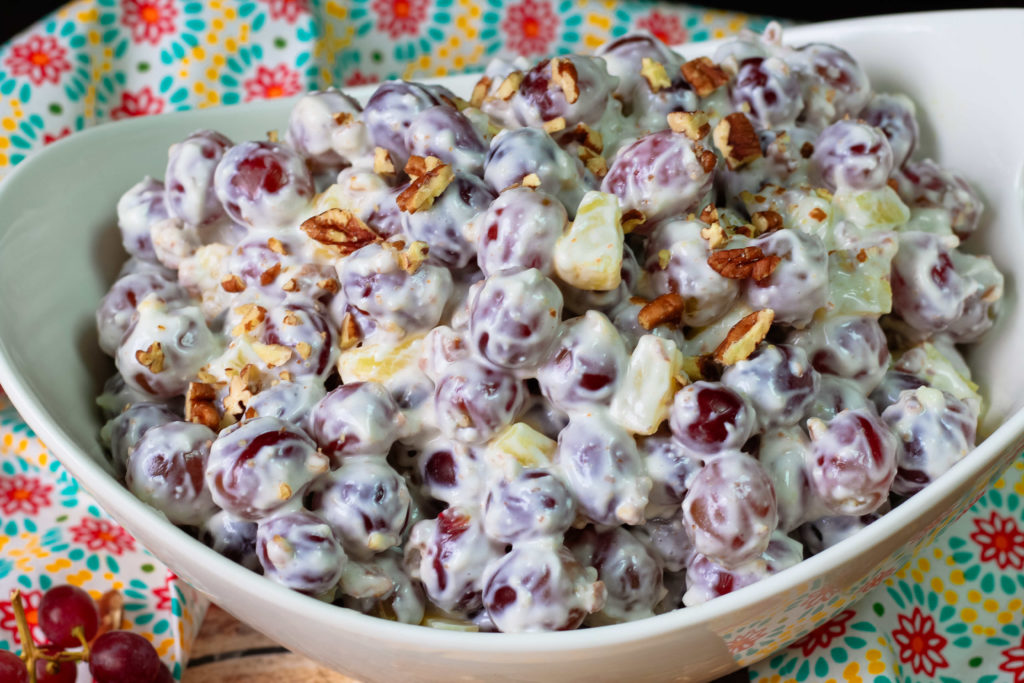 Close up of grape salad garnished with pecans