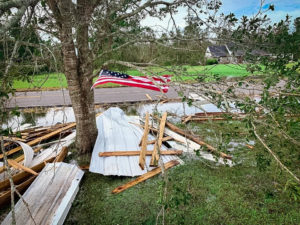 Hurricane debris with an american flag