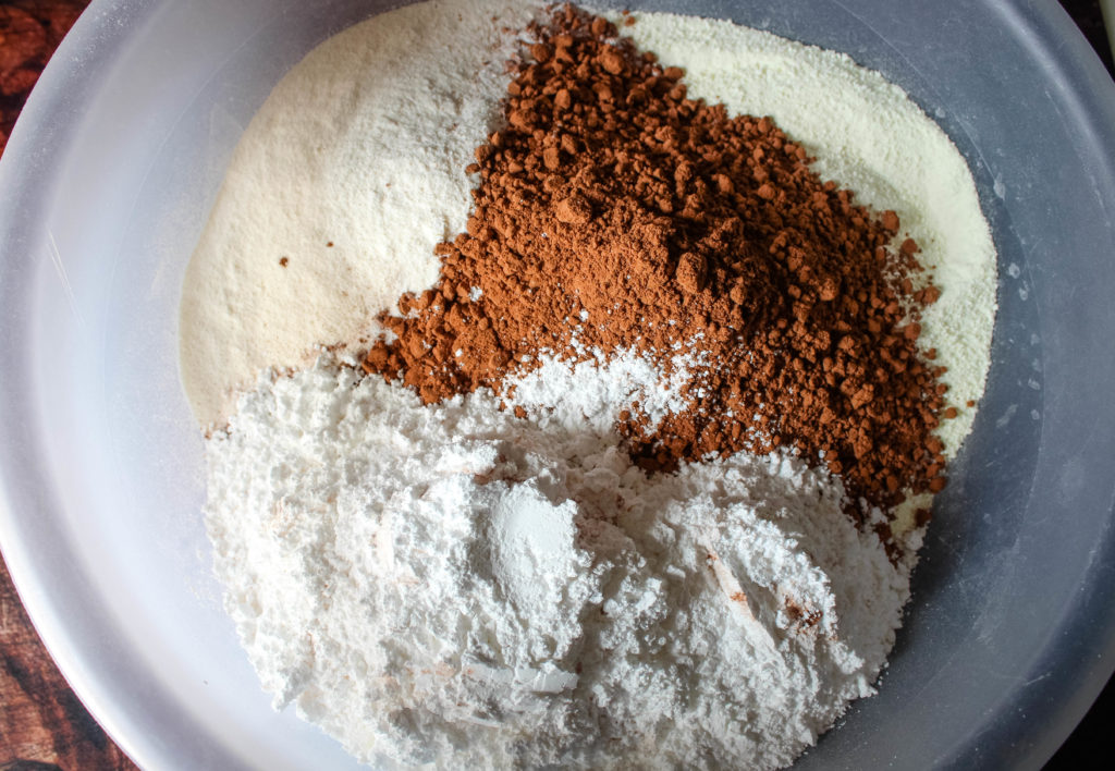All of the ingredient for a hot cocoa mix in a bowl