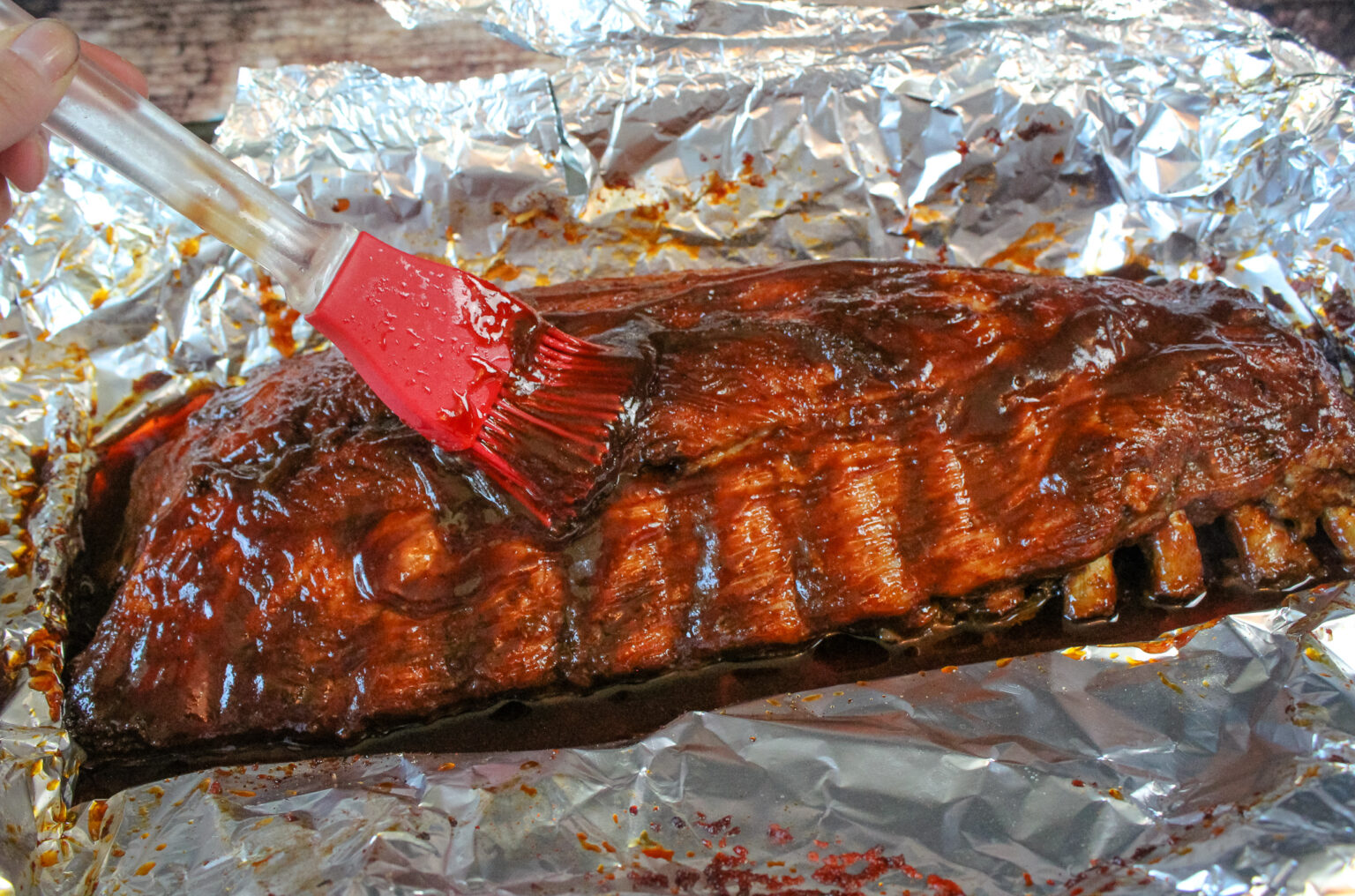Oven Baked BBQ Baby Back Ribs Baked Broiled and Basted