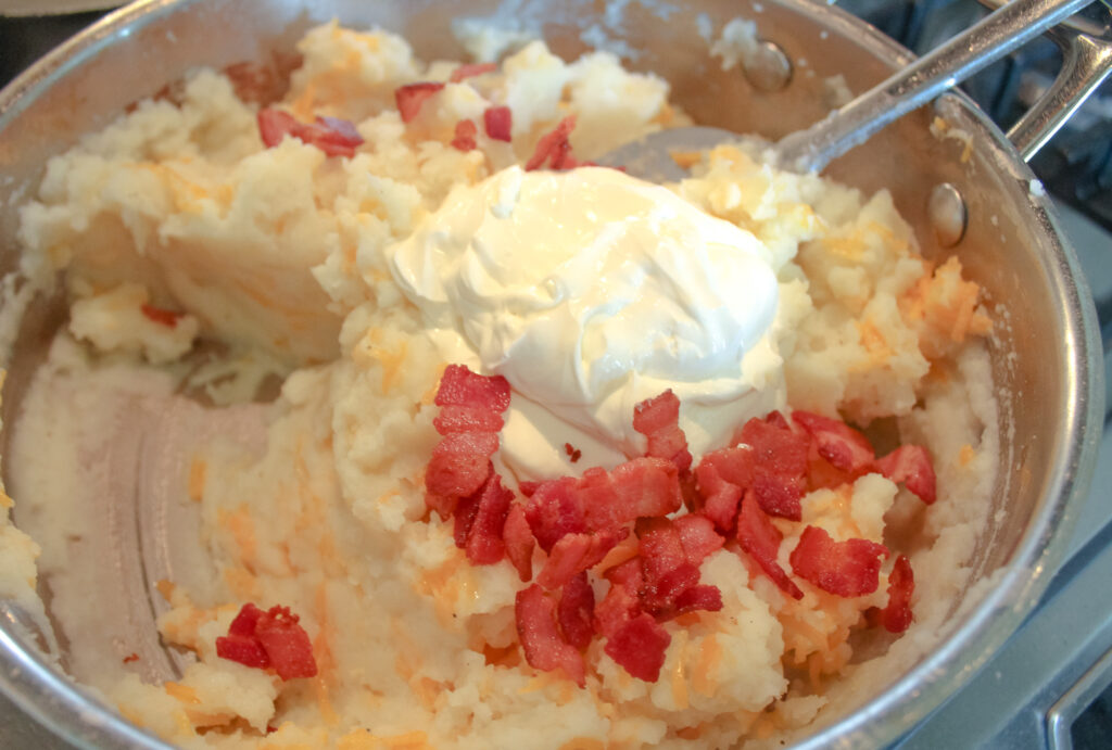 Sour Cream and bacon added to potato casserole