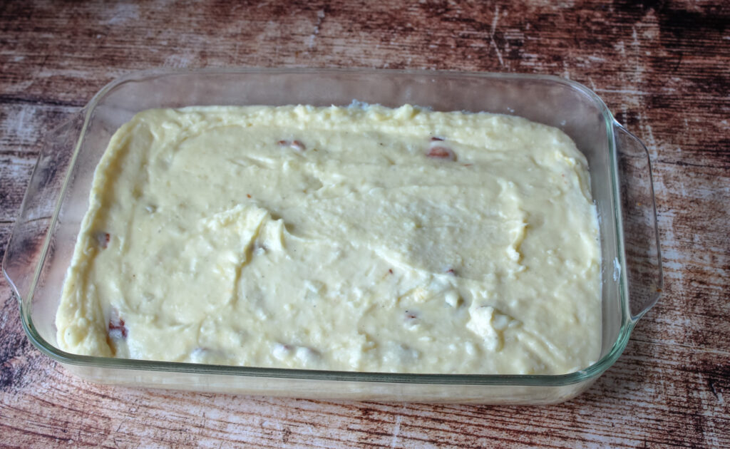 Potato casserole in a dish before it goes into oven