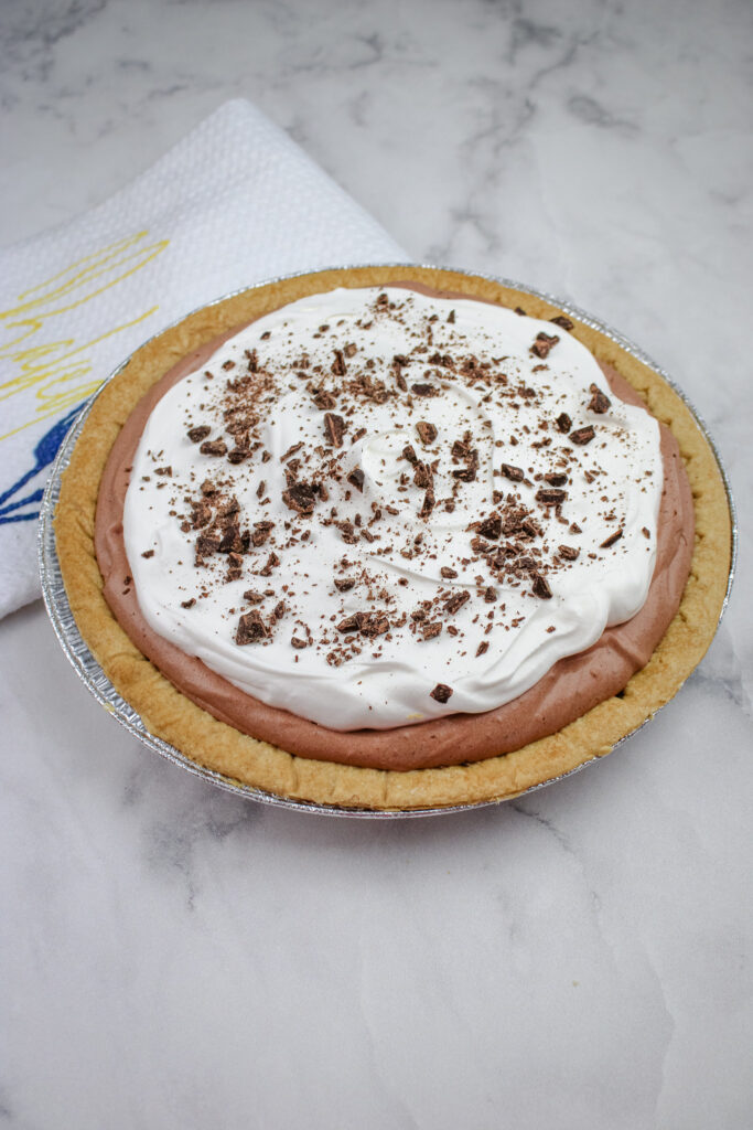 Easy Chocolate Cream Pie on a white marble counter top 