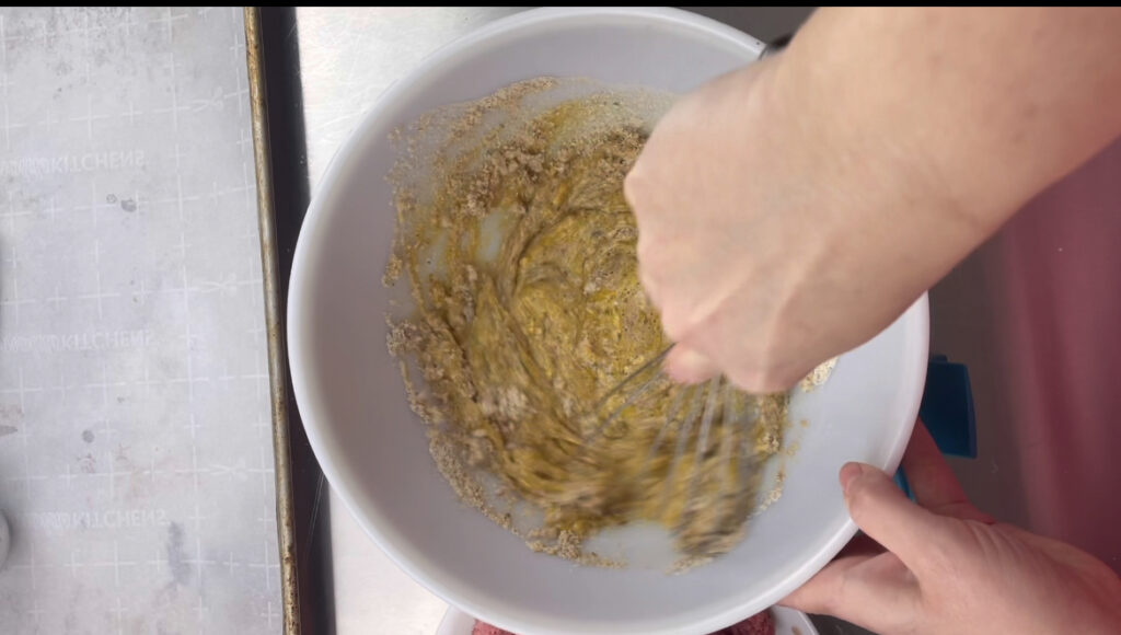 The egg mixture being mixed 