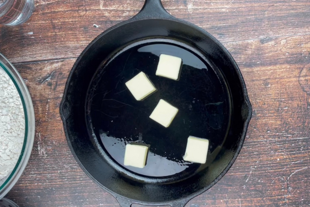 Butter in a cast iron skillet 