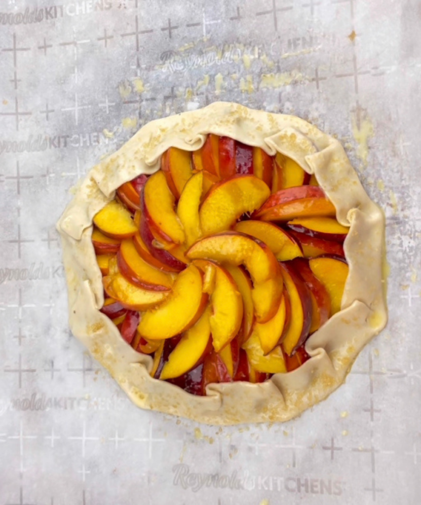 A peach galette before it went in the oven 