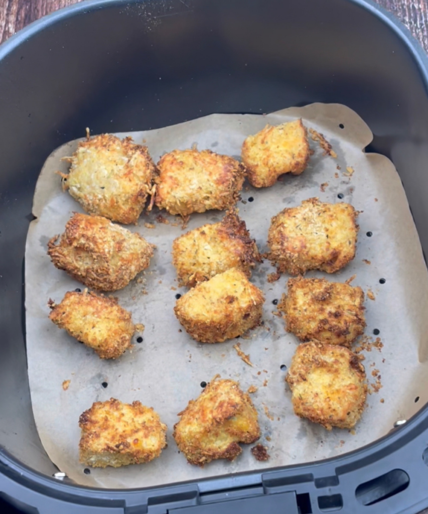 Mac and Cheese Bites cooked in a fryer basket 