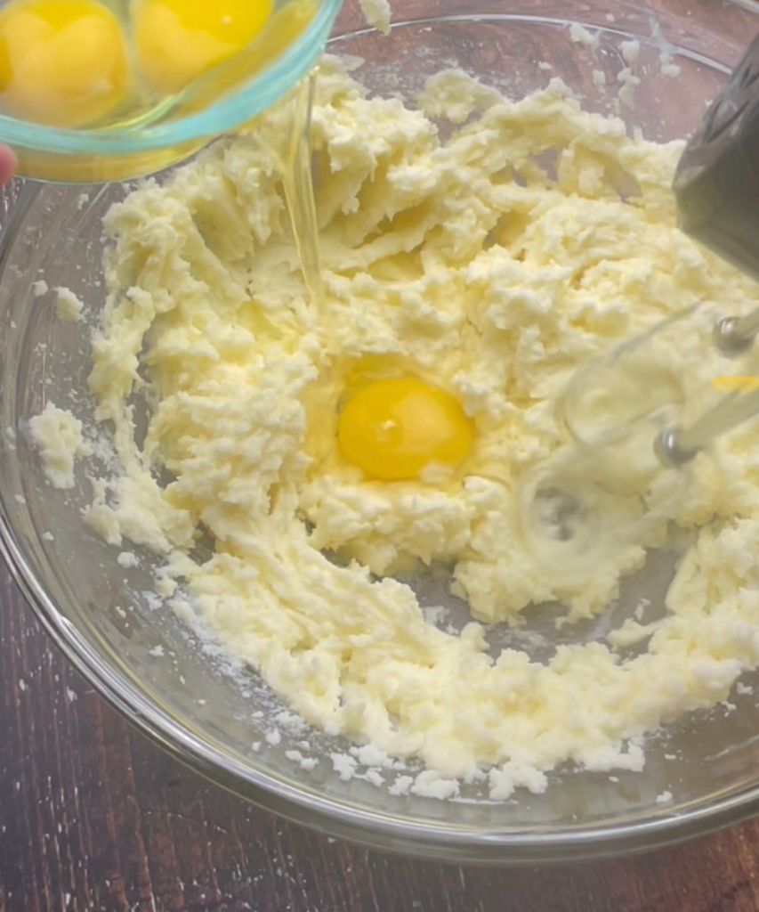 Eggs being added to the butter mixture