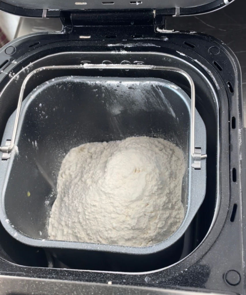 All of the dry ingredients added to the bread machine 
