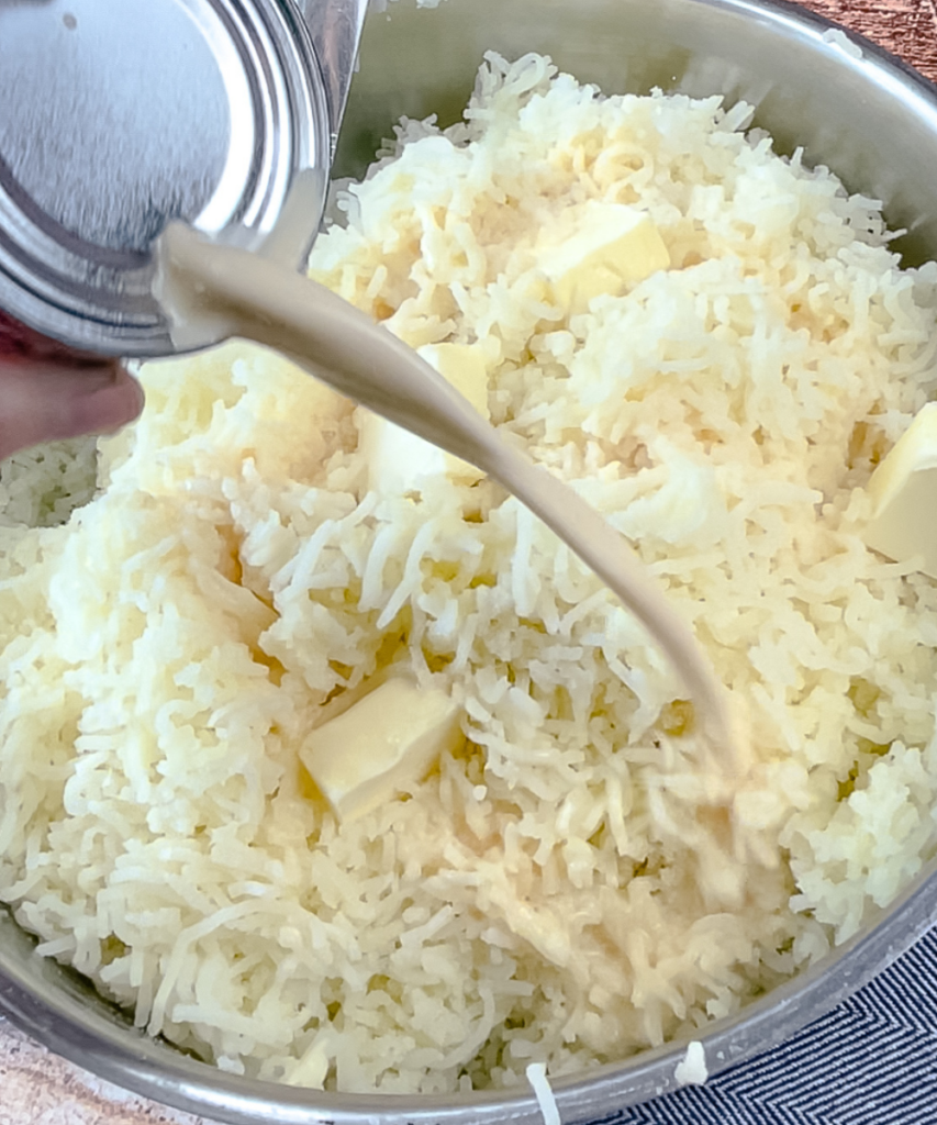 Adding evaporated milk to potatoes