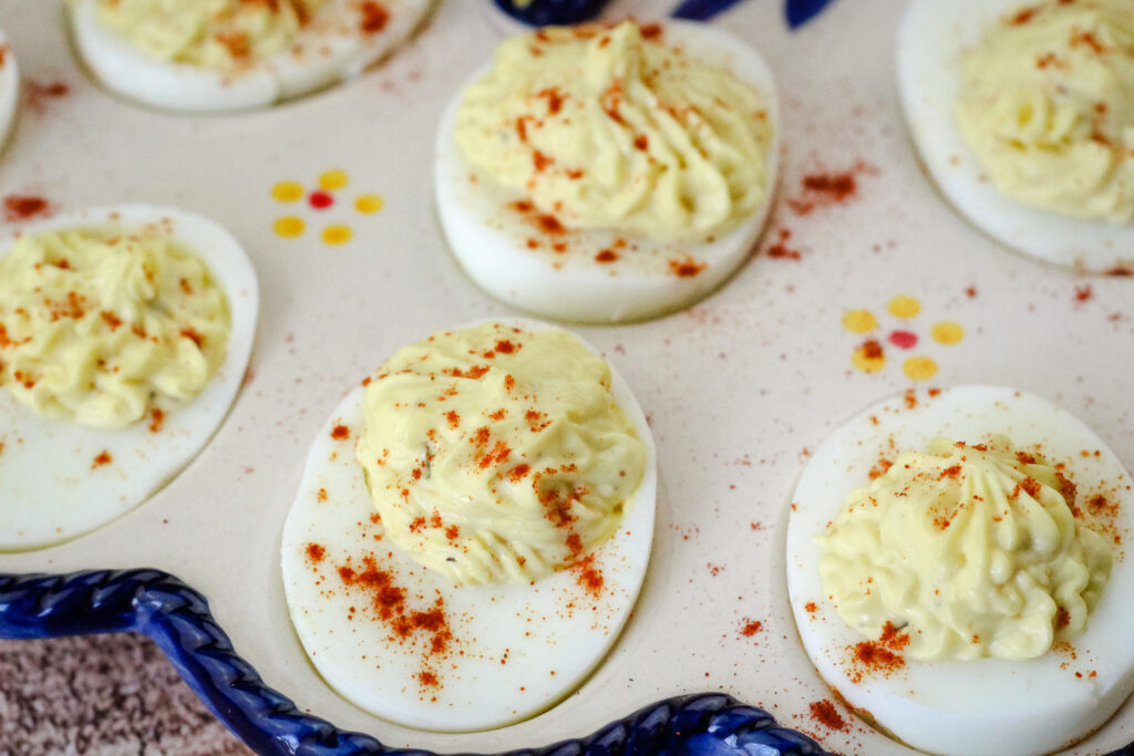 Smoked paprika sprinkled on southern deviled eggs