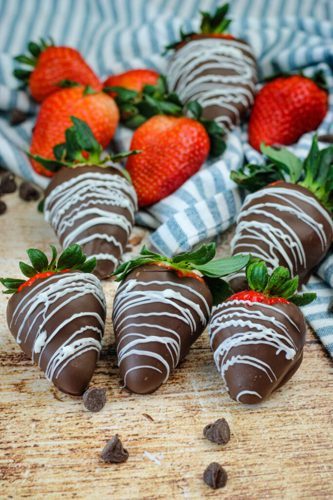 Chocolate covered strawberries with a white drizzle