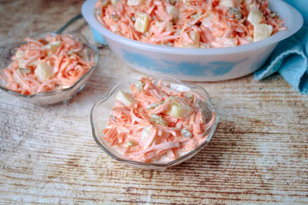 Old fashioned carrot salad in a small serving dish 